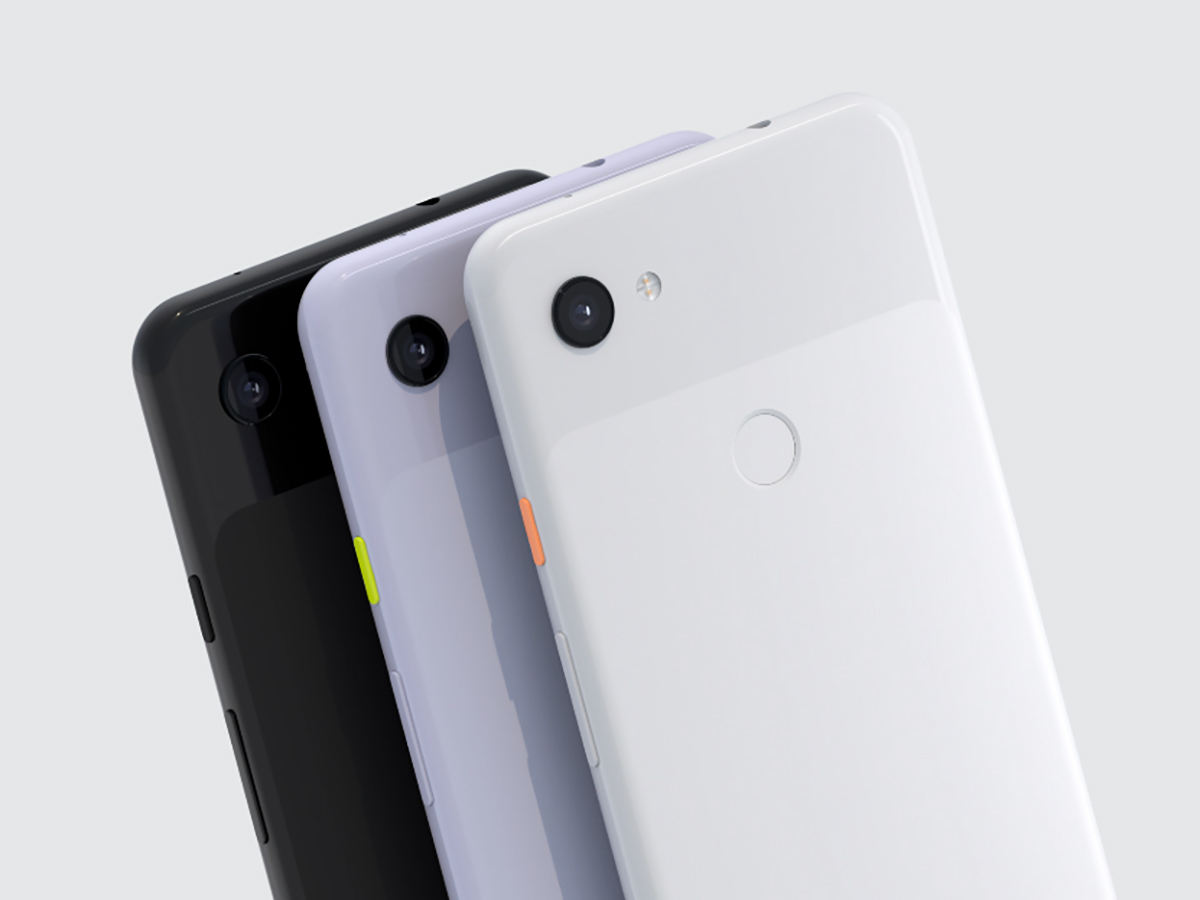 Three Google Pixel phones in black, gray, and white