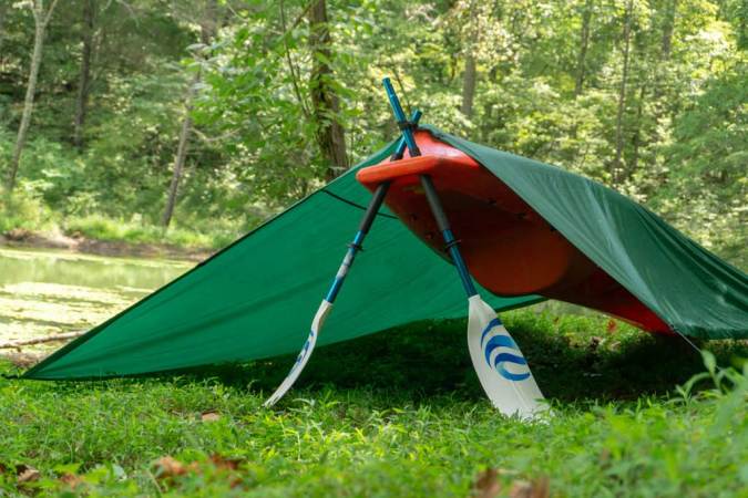 Stay warm and dry with these improvised tarp shelters