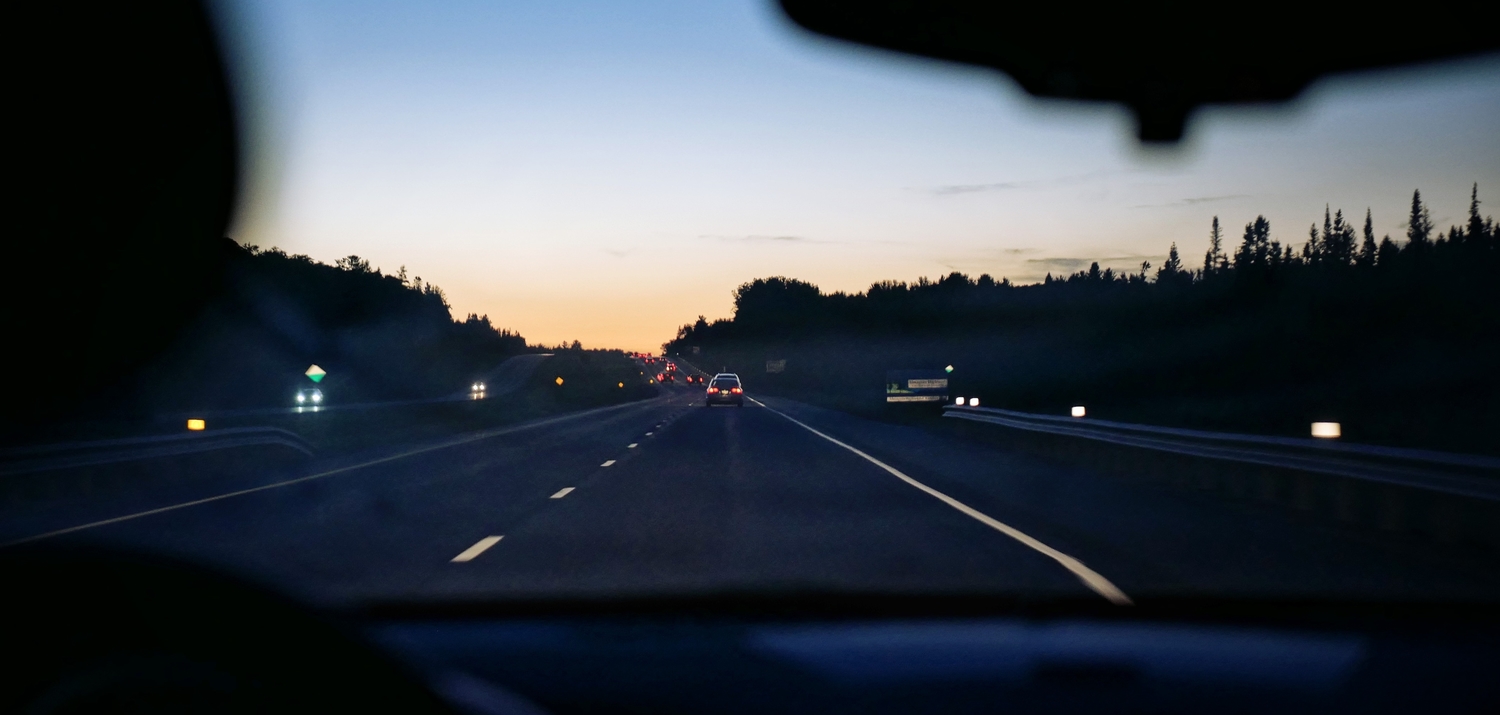 view of a highway from inside a car