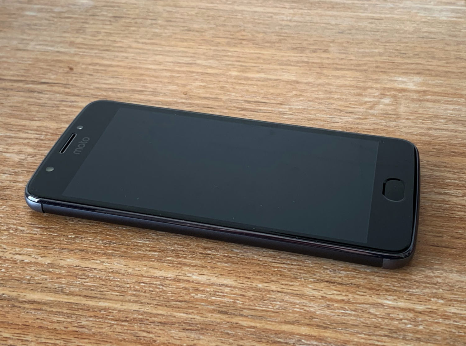 smartphone on a wooden table