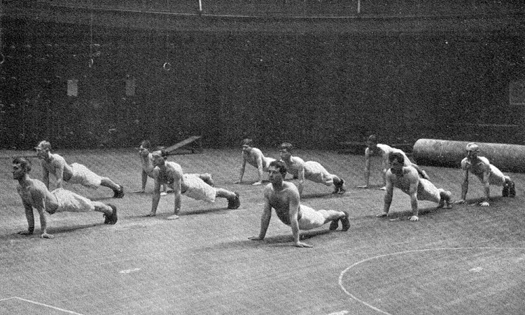 Soldiers exercising in a gymnasium