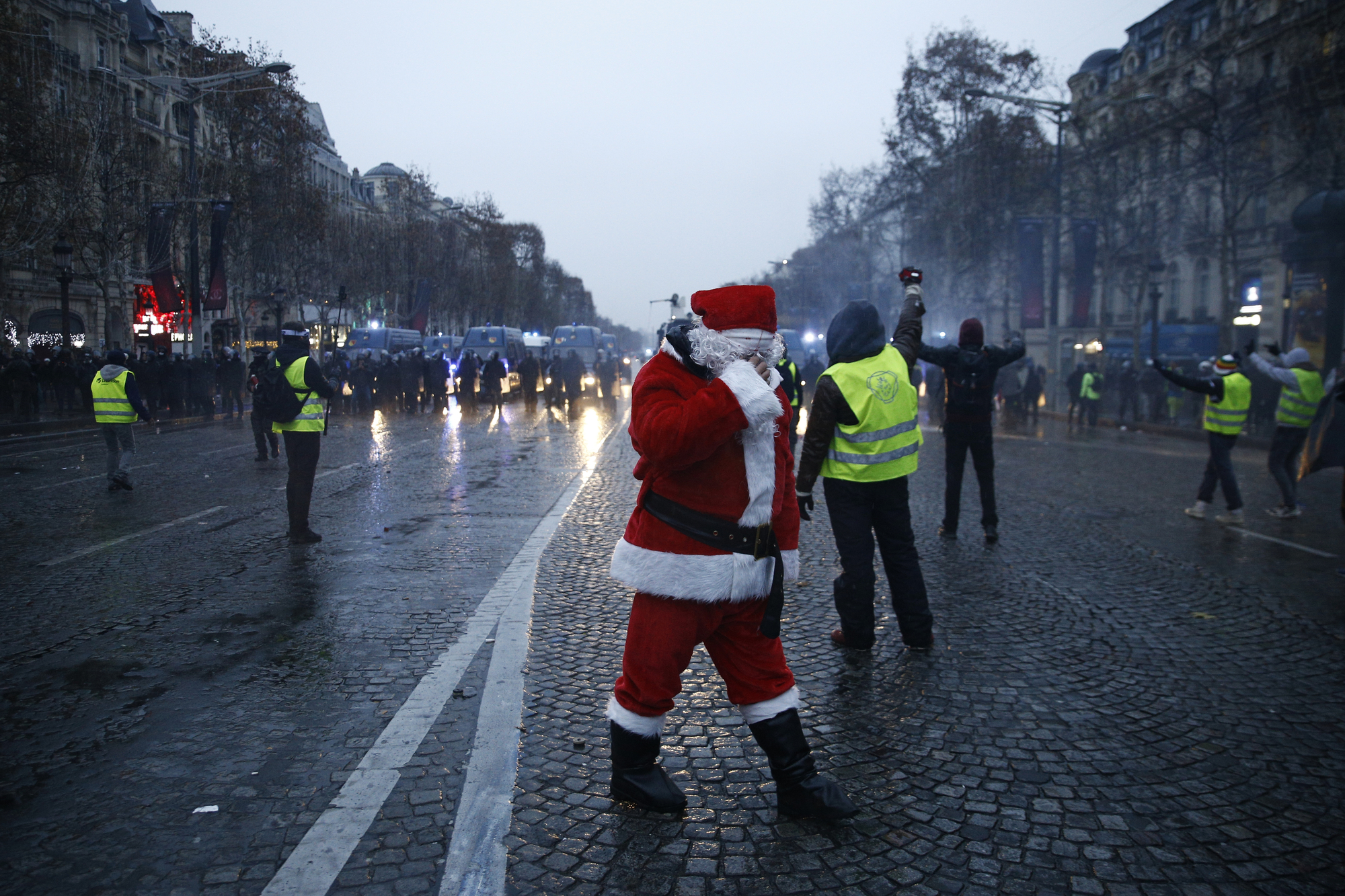 Protester dressed as santa claus in the Paris Riots