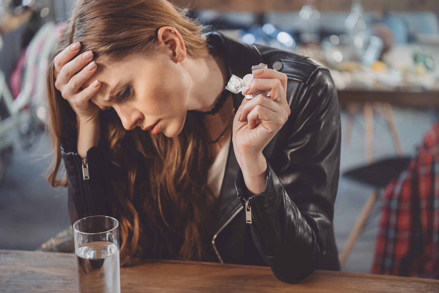 Young woman with a hangover