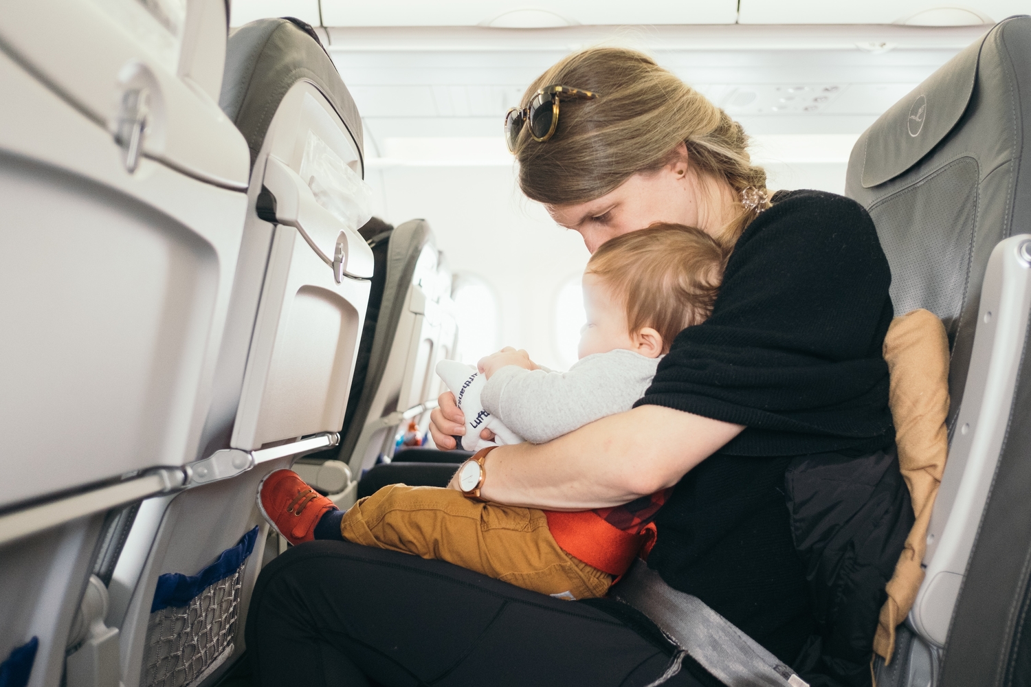 Mom with baby on a plane