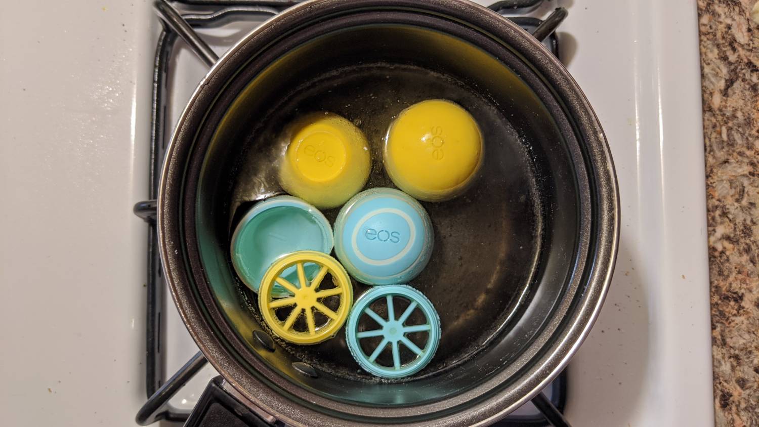 Egg container pieces boiling.