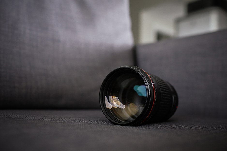 camera lens on a couch