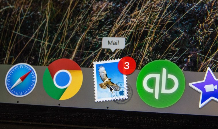 The Mac Dock, showing icons for Mail and other apps.