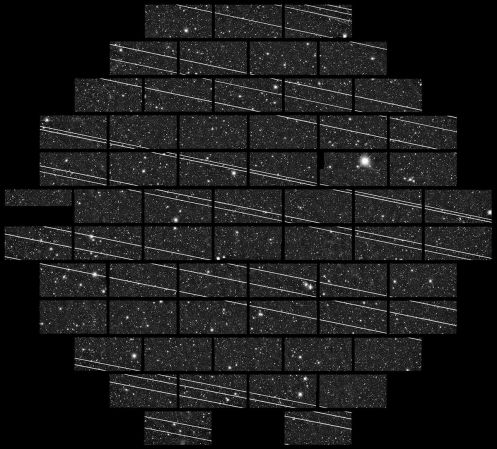 Starlink satellites streak across telescope images of the stars.