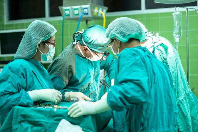 doctors performing a surgery in a hospital
