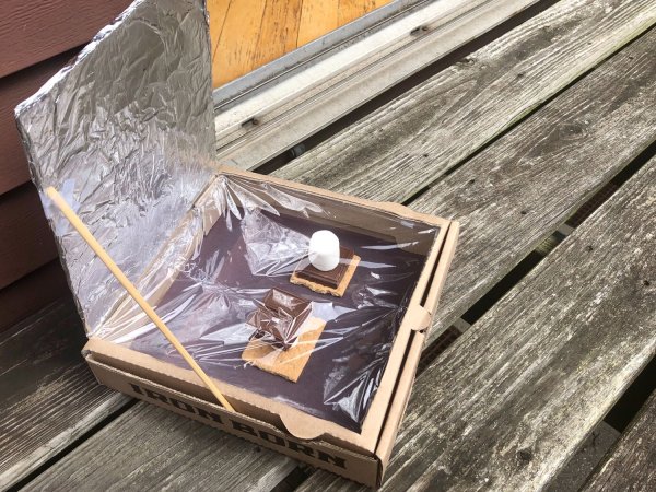 a DIY solar oven baking s'mores