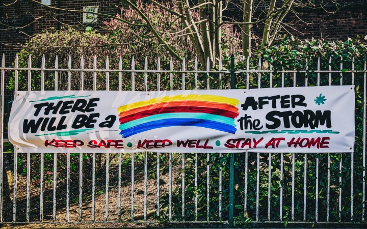 A school in Belfast, Ireland hangs up a banner that says, "there will be a storm after the storm."