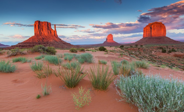 Monument Valley, a popular tourist attraction, lies within Navajo Nation territory along the Arizona-Utah border.