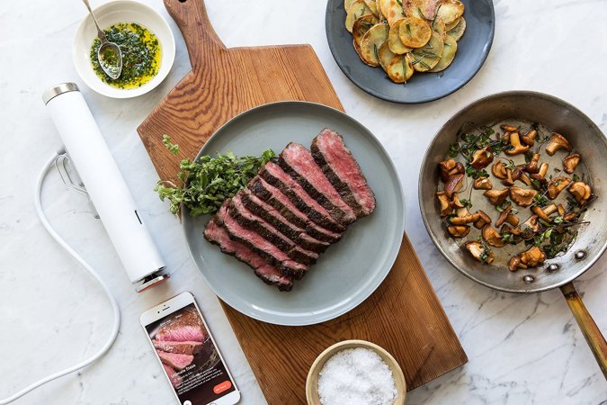 food on a table next to sous vide