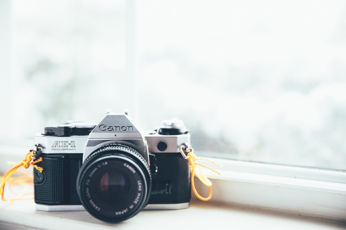 Canon camera on a shelf