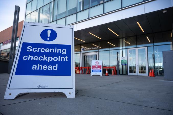 A COVID-19 screening checkpoint at Chinook Regional Hospital in Alberta, Canada