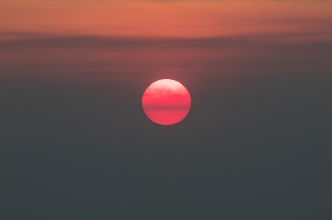 A red and orange sunset over San Francisco