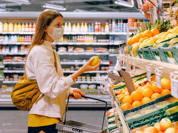 woman shopping with face mask on