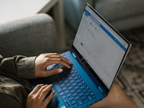 a person using a Windows 10 laptop