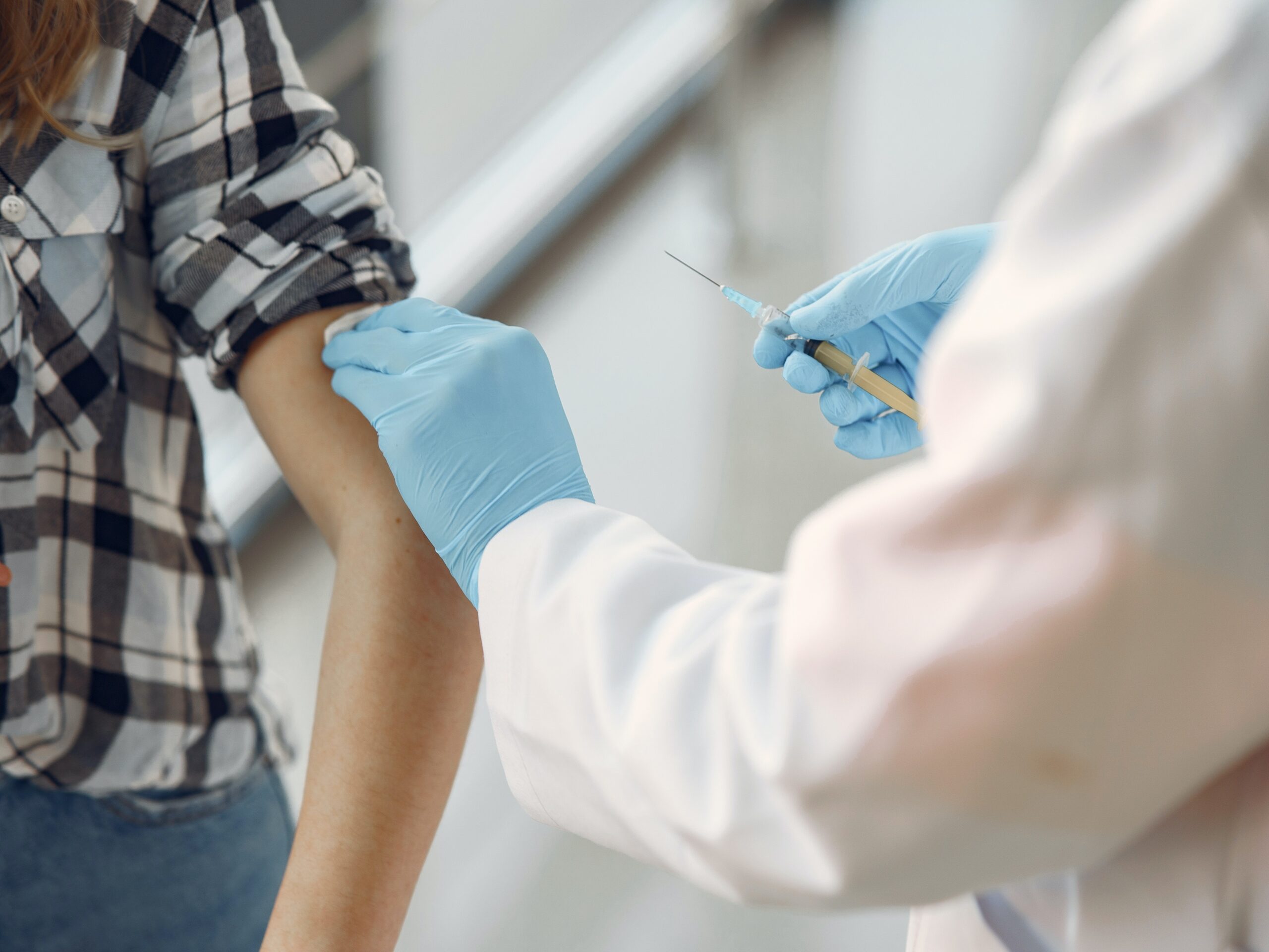 Someone receiving a vaccine