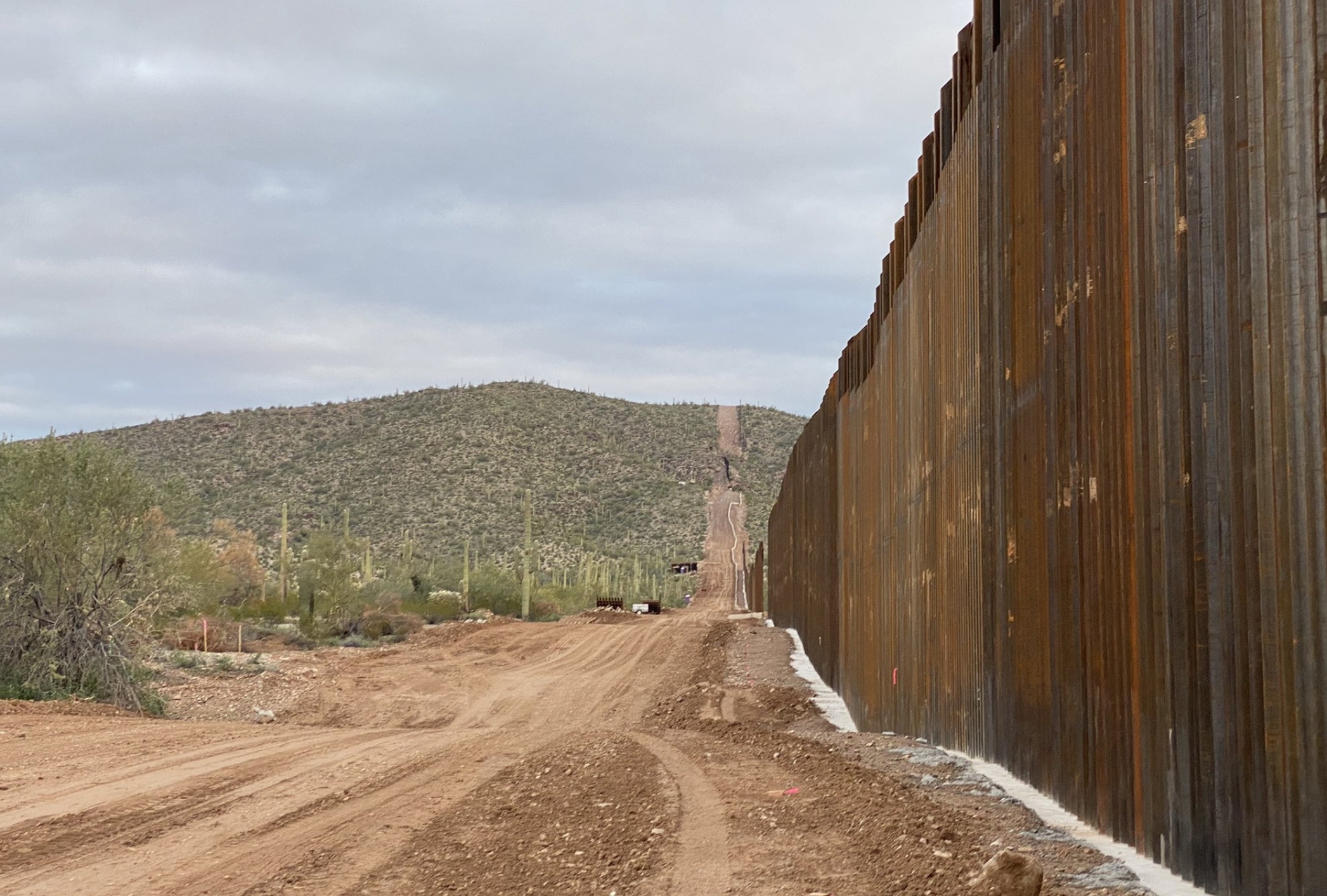 The Trump border wall made of concrete and steel on the edge of Organ Pipe Cactus National Monument in Arizona