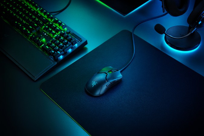 Razer Viper 8K gaming mouse on a desk with a PC.