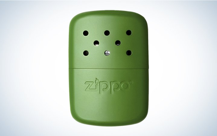  A green Zippo Hand Warmer on a plain background