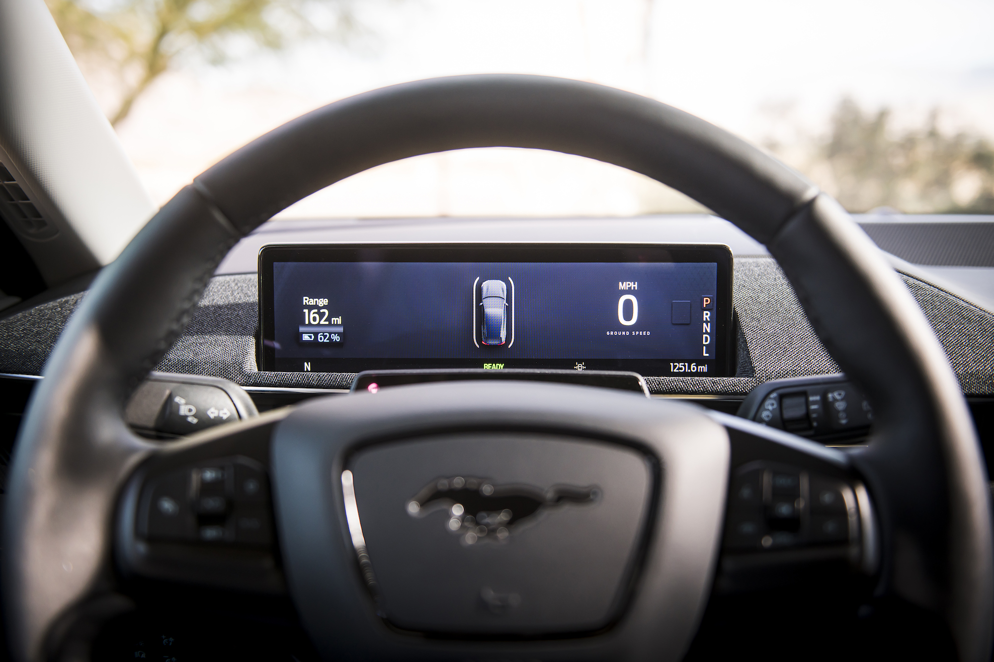 The digital instrument cluster in front of the driver on the Mustang Mach-E.