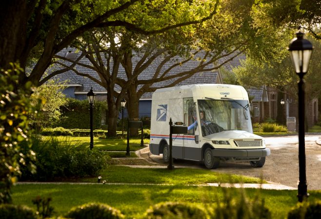 New USPS mail delivery truck in a simulated suburb