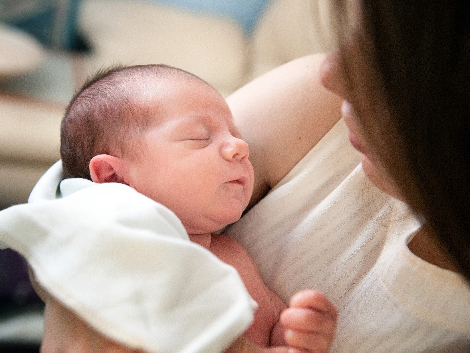 newborn baby with its parent