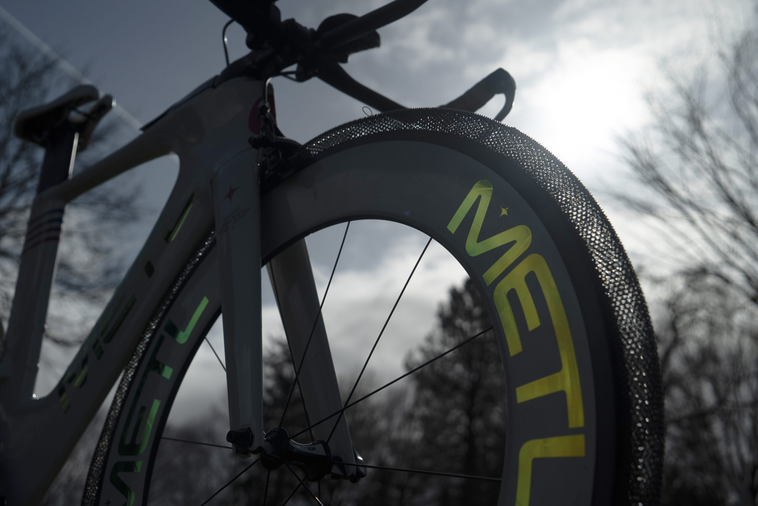 The METL bike tire on a bike with the sky in the background