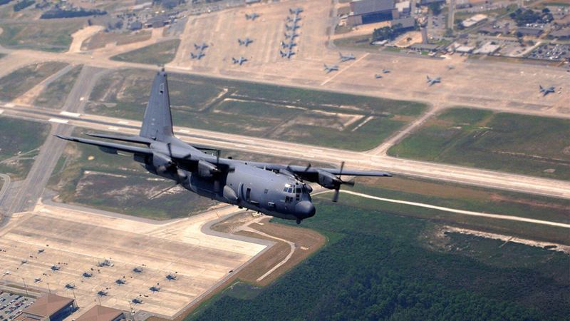 AC 130 Spectre Gunship over an airfield in Florida