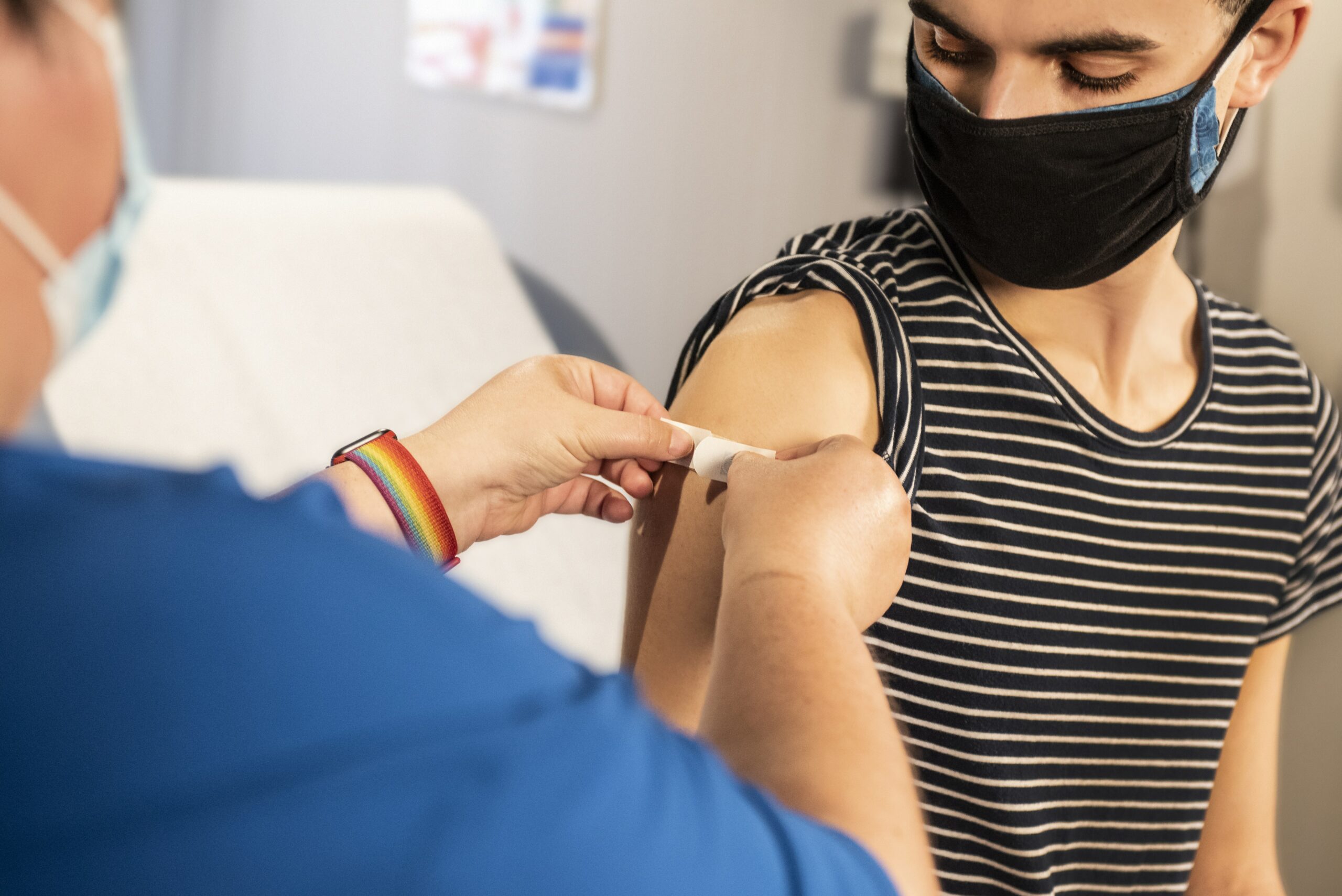 young person gets vaccine