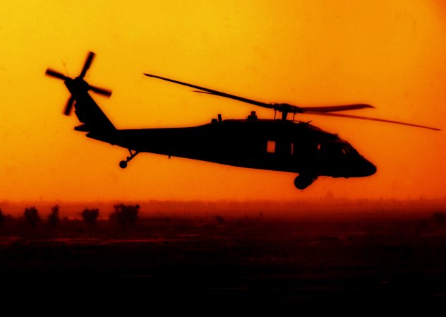 A flying Black Hawk helicopter in Iraq.