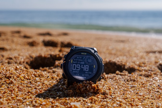  Garmin Descent G1 Solar best Garmin watch for diving in the sand on a beach