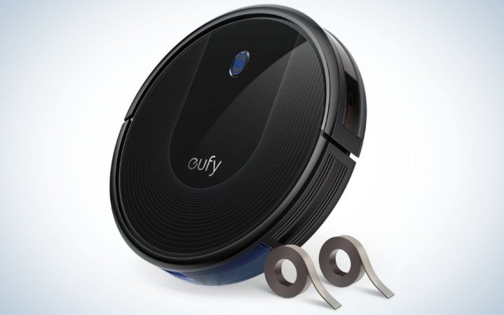  Thin, black robot vacuum cleaner for hardwood floors with boundary stripes