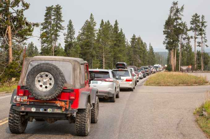 Long line of cars at a Yellowstone National Park entrance