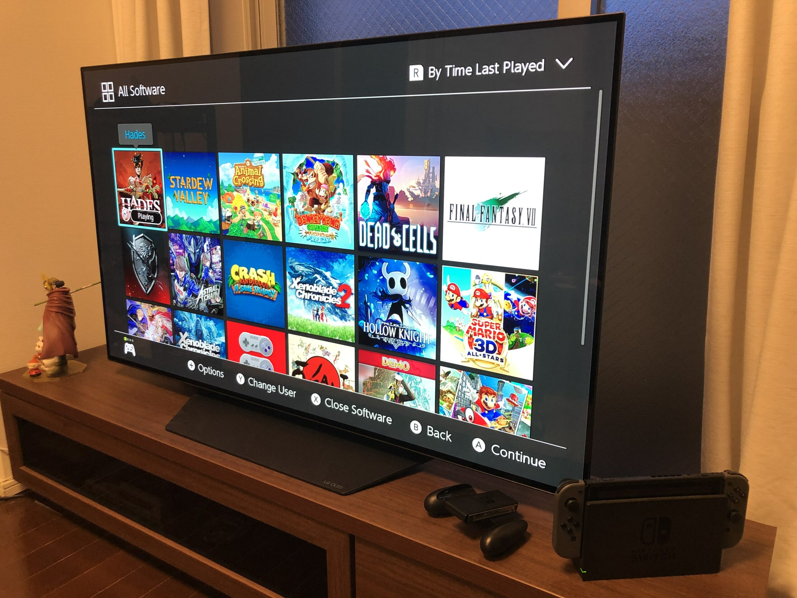 Nintendo Switch docked next to a flatscreen TV