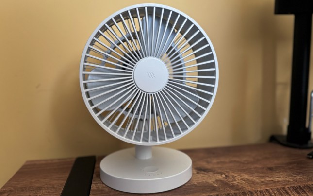 Windmill Fan on the top of a desk.