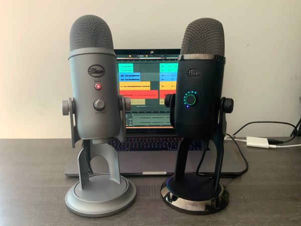 Blue Microphone Yeti and Yeti X in front of a computer