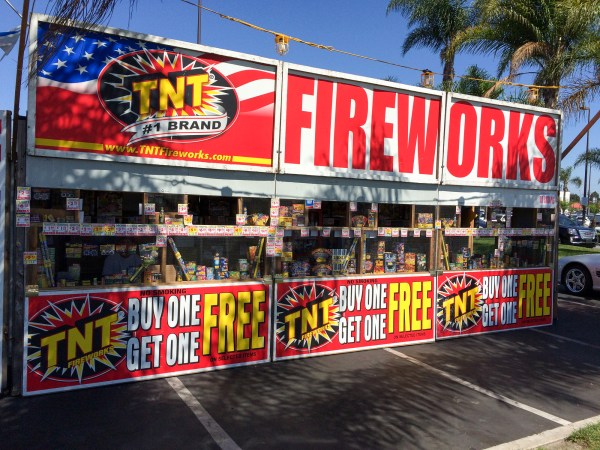 A fireworks stand with buy one get one free signs