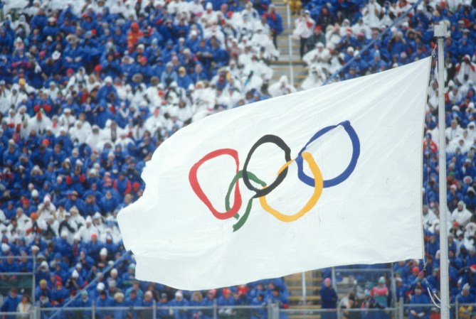 White Olympics five-ring flag flying during the 1988 summer games in Seoul