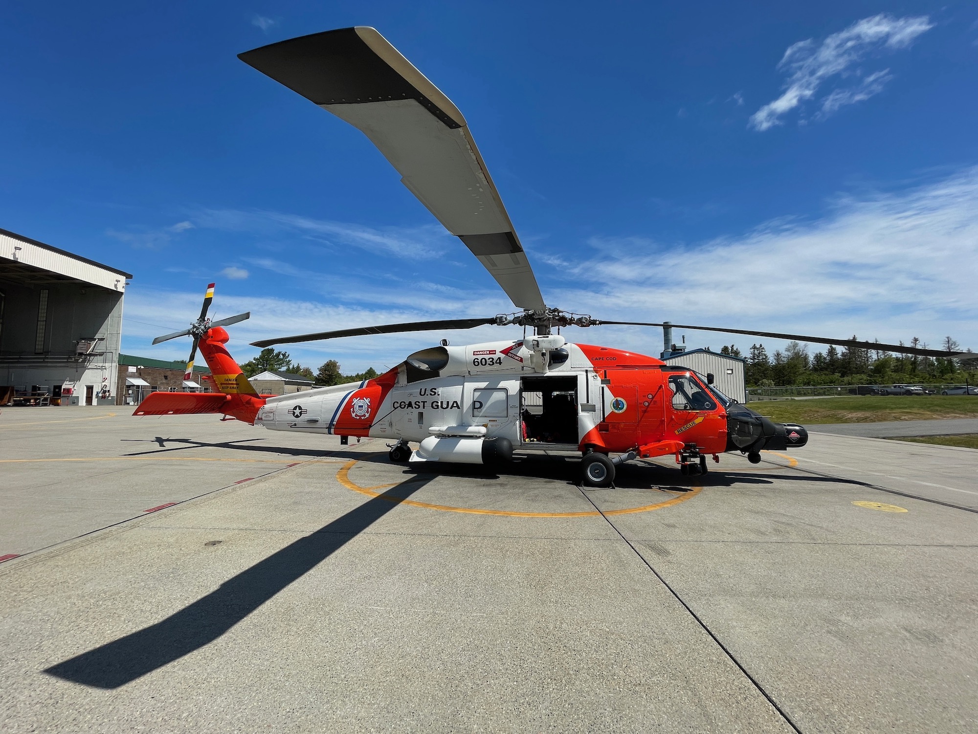 A Coast guard helicopter on the ground