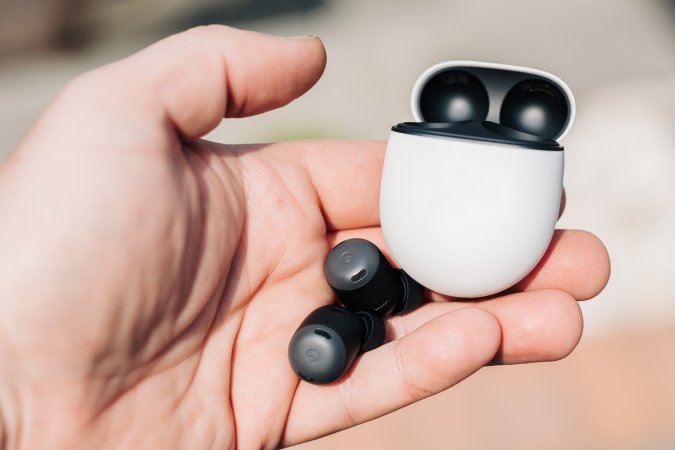  Google Pixel Buds Pro earbuds plus case held in the sunlight