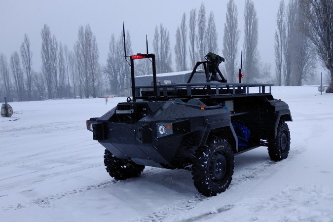 a robotic military vehicle in the snow