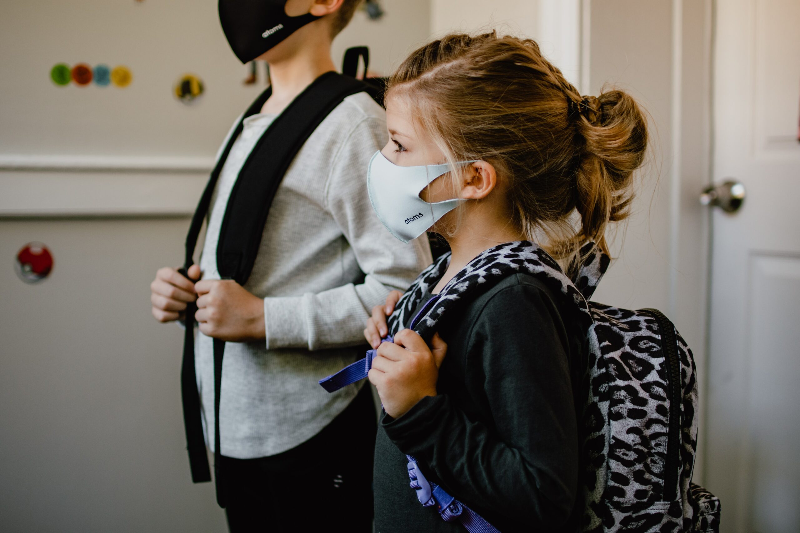 young girl wearing mask