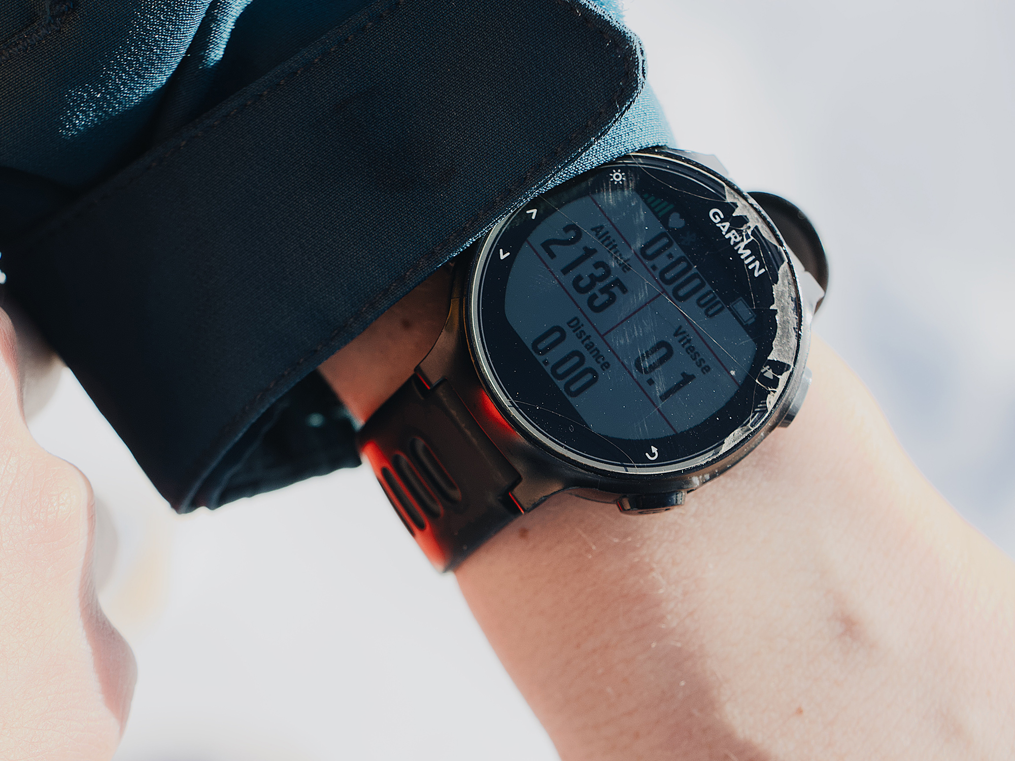 A person wearing a Garmin smartwatch.