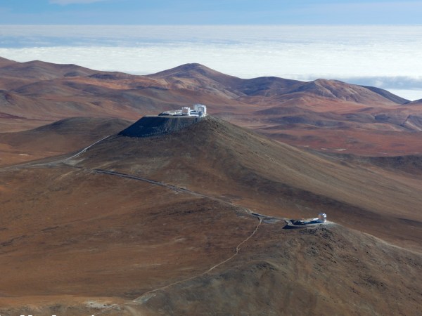 Aerial view of Paranal with VISTA in the foreground and the Very Large Telescope in the background.