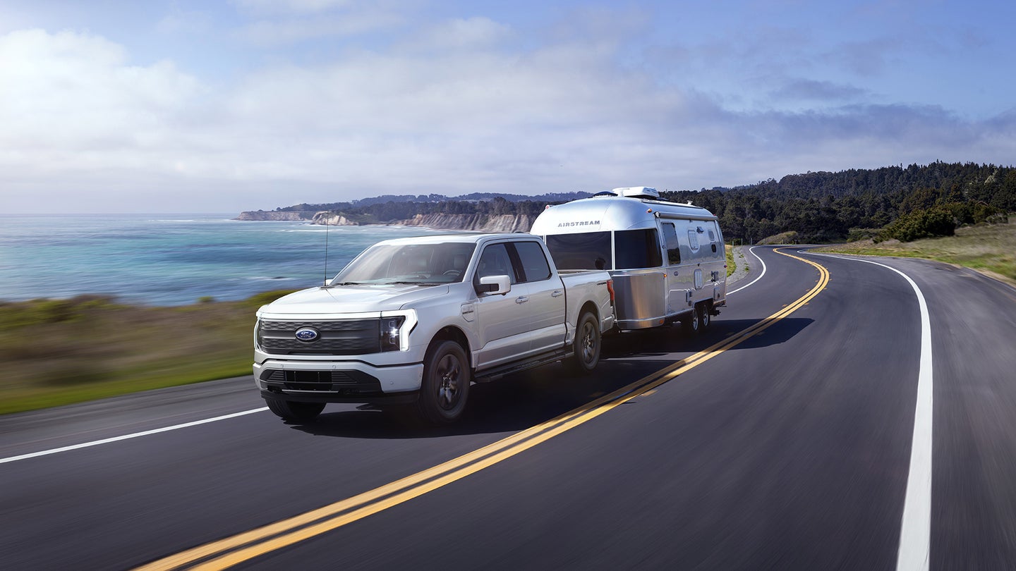 White Ford electric F-150 truck with towing capacity