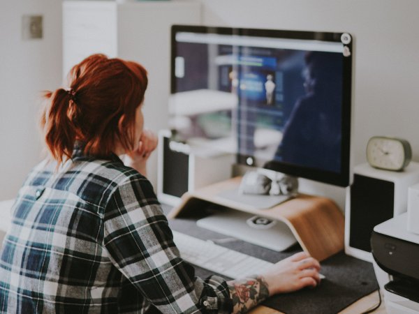 Person-working-on-desktop-computer