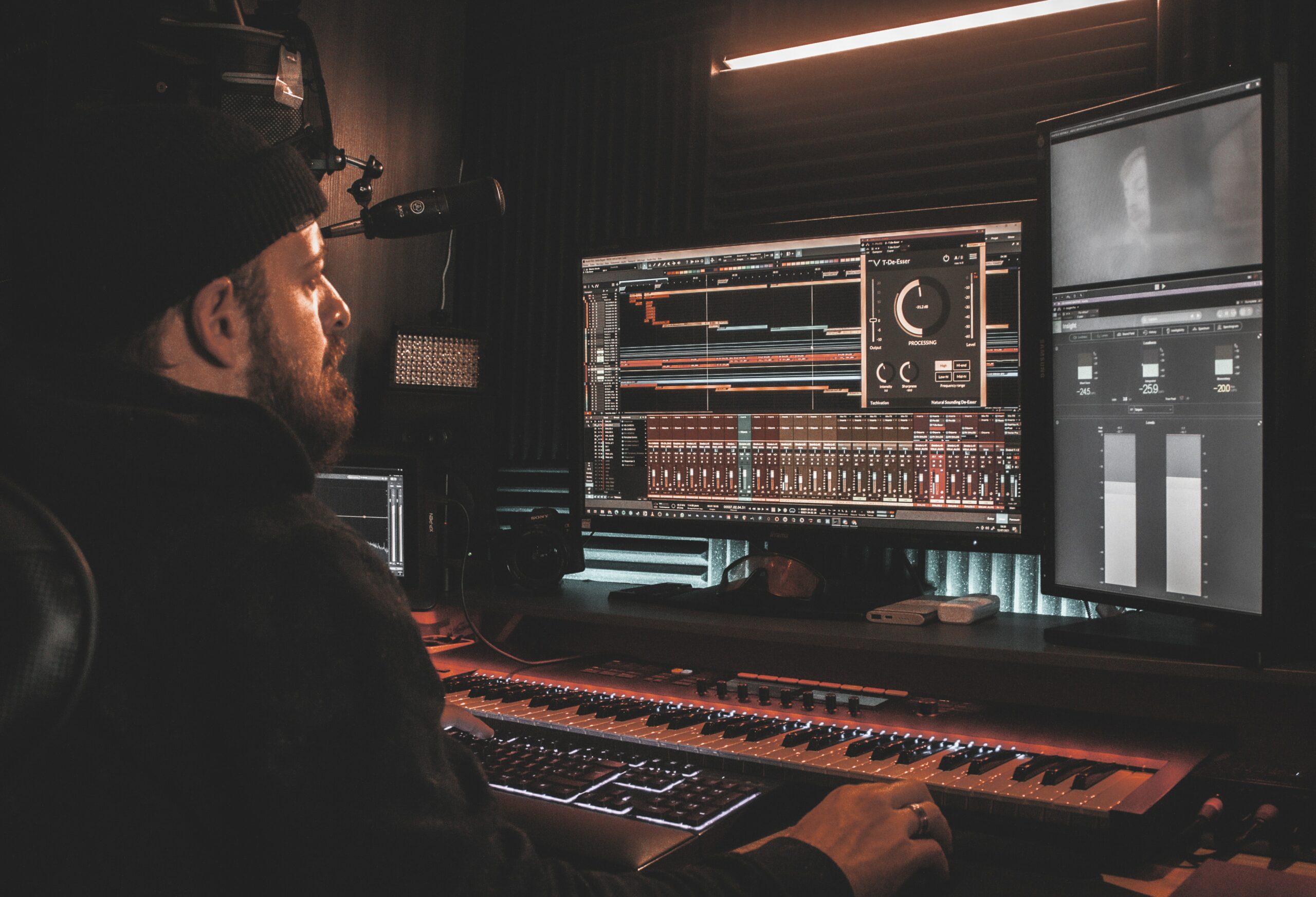 Man stares at a DAW in his studio